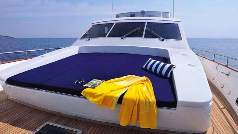 private yacht rental Mykonos, relaxing, sunbeds, luxury wellness